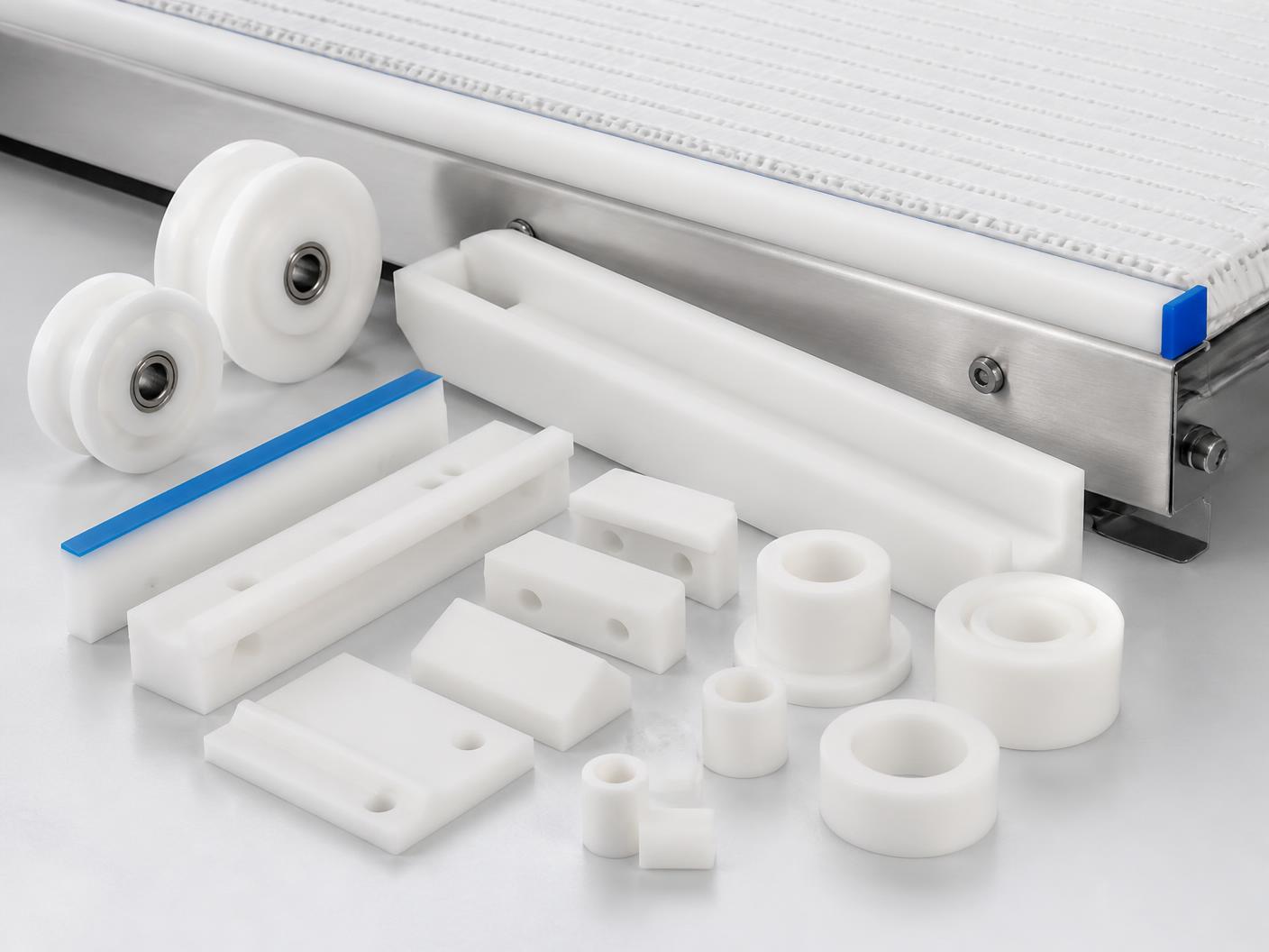 Guias, roldanas, raspadores e buchas em POM, UHMW e Nylon branco para transporte e embalagem industrial